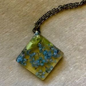 Blown multi color glass squared pressed flower necklace